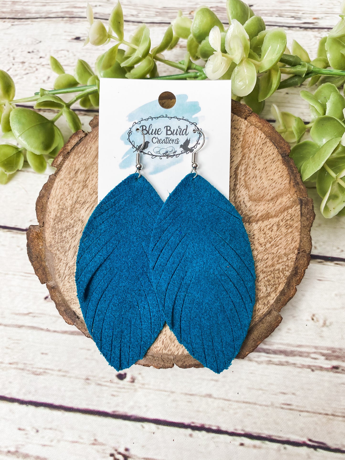 Turquoise Suede Feather