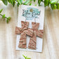 Embossed Blush Crosses