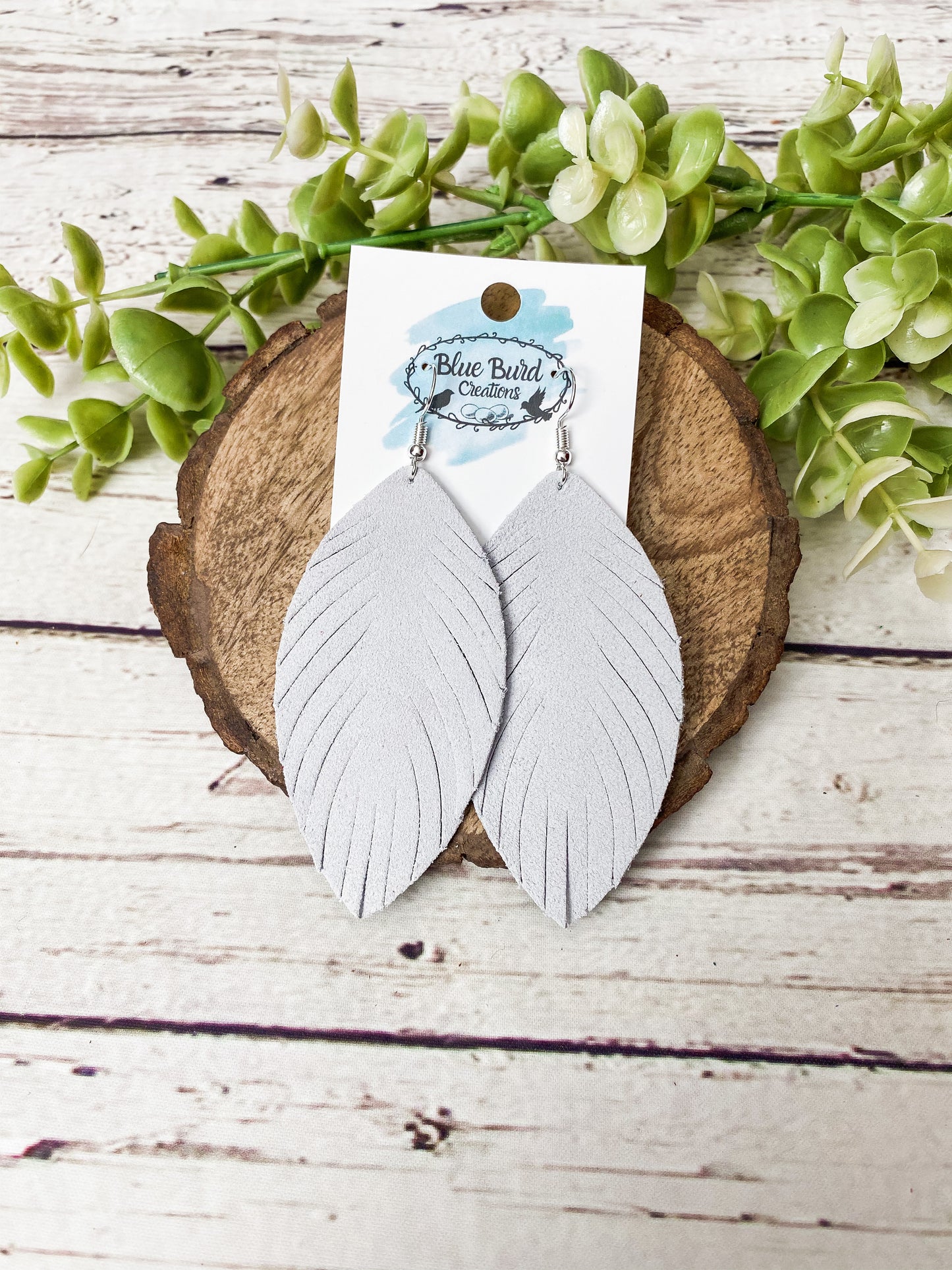 Snow White Suede Feather